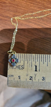 Load image into Gallery viewer, Prehistoric Works Sterling Silver Mini Pontus Cross with a ruby set in 24K gold